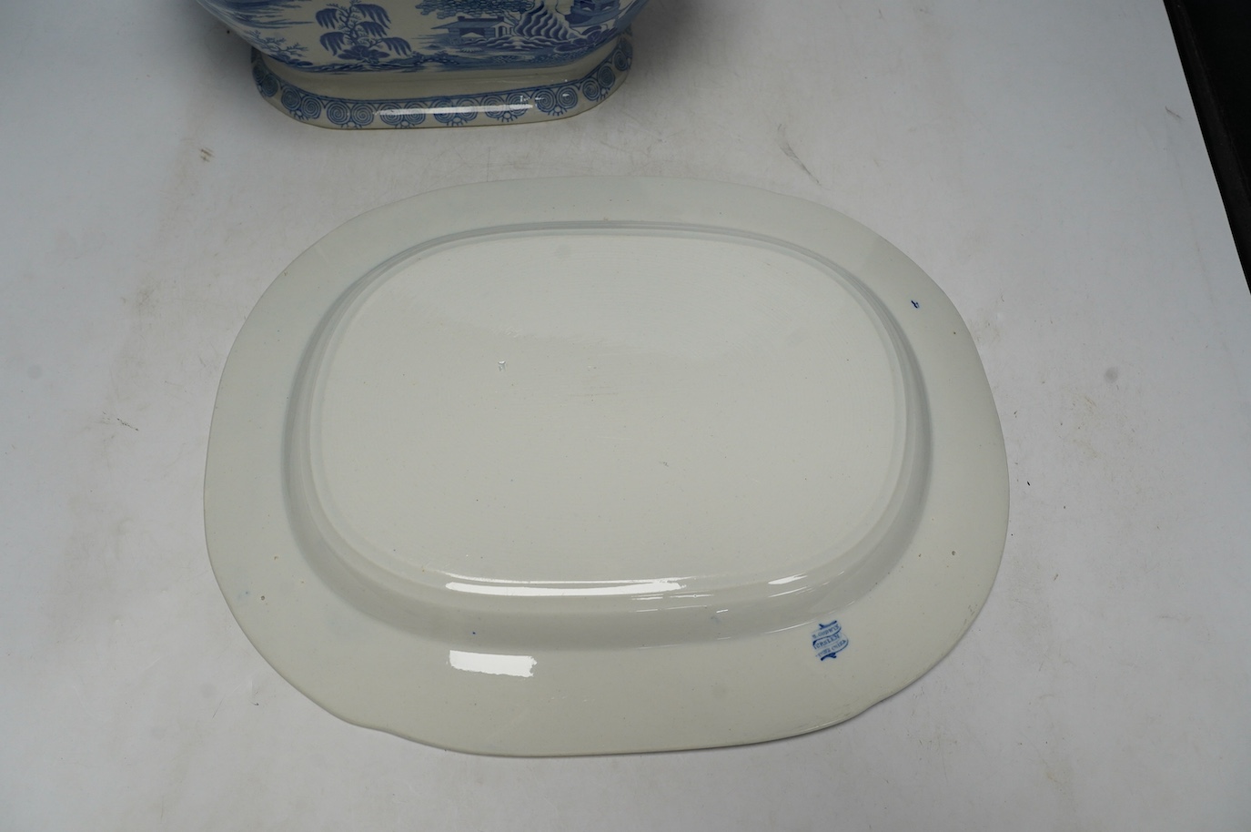 A Victorian Staffordshire blue and white pottery soup tureen and cover, together with a meat dish (2). Condition - tureen cover cracked